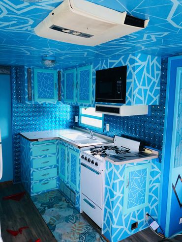Fully custom renovated RV for a California desert resort. Themed and colored to match an afternoon