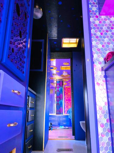 Fully custom renovated RV for a California desert resort. Themed and colored to match a setting sun.