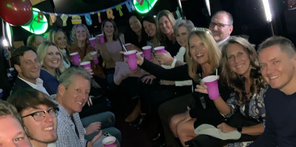 large group having a birthday party in party bus rental