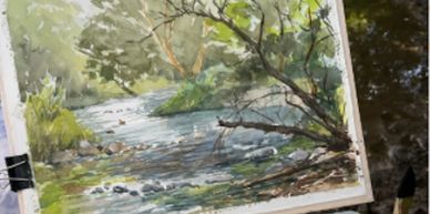 Watercolor painting of a serene river scene with trees and rocks.