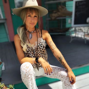 Bold meets boho—lace bell bottoms and wild prints styled with effortless edge.