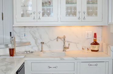 White counters in a kitchenette