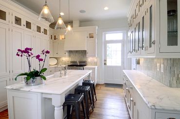 High-end marble countertops in a white kitchen