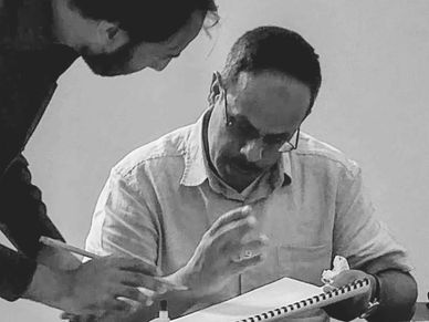 Razwan Ul-Haq learning calligraphy from Master Nassar Mansour