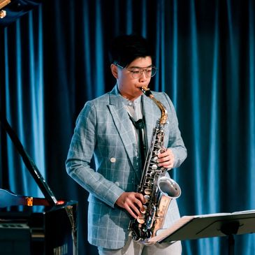 Yin Tak Au performing saxophone with pianist Cherry Tsang at Eaton Club Hong Kong
Presented by music