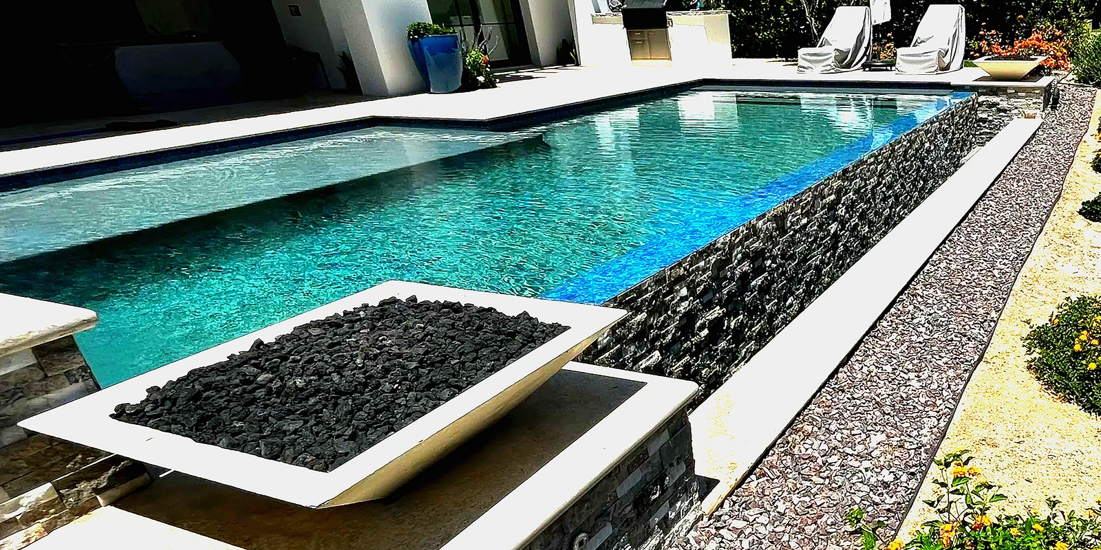 Pool with fire bowls