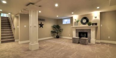 a fully renovated basement, new floor, painted walls & ceiling, led spot lights