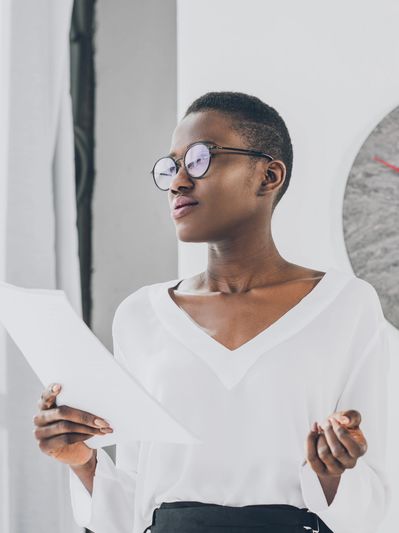 african american woman in white shirt