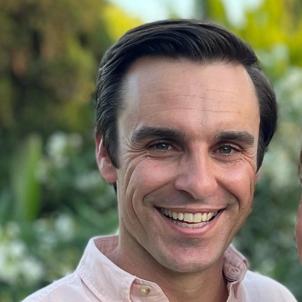 Image of Director Jack Francis and his partner in a sunny garden