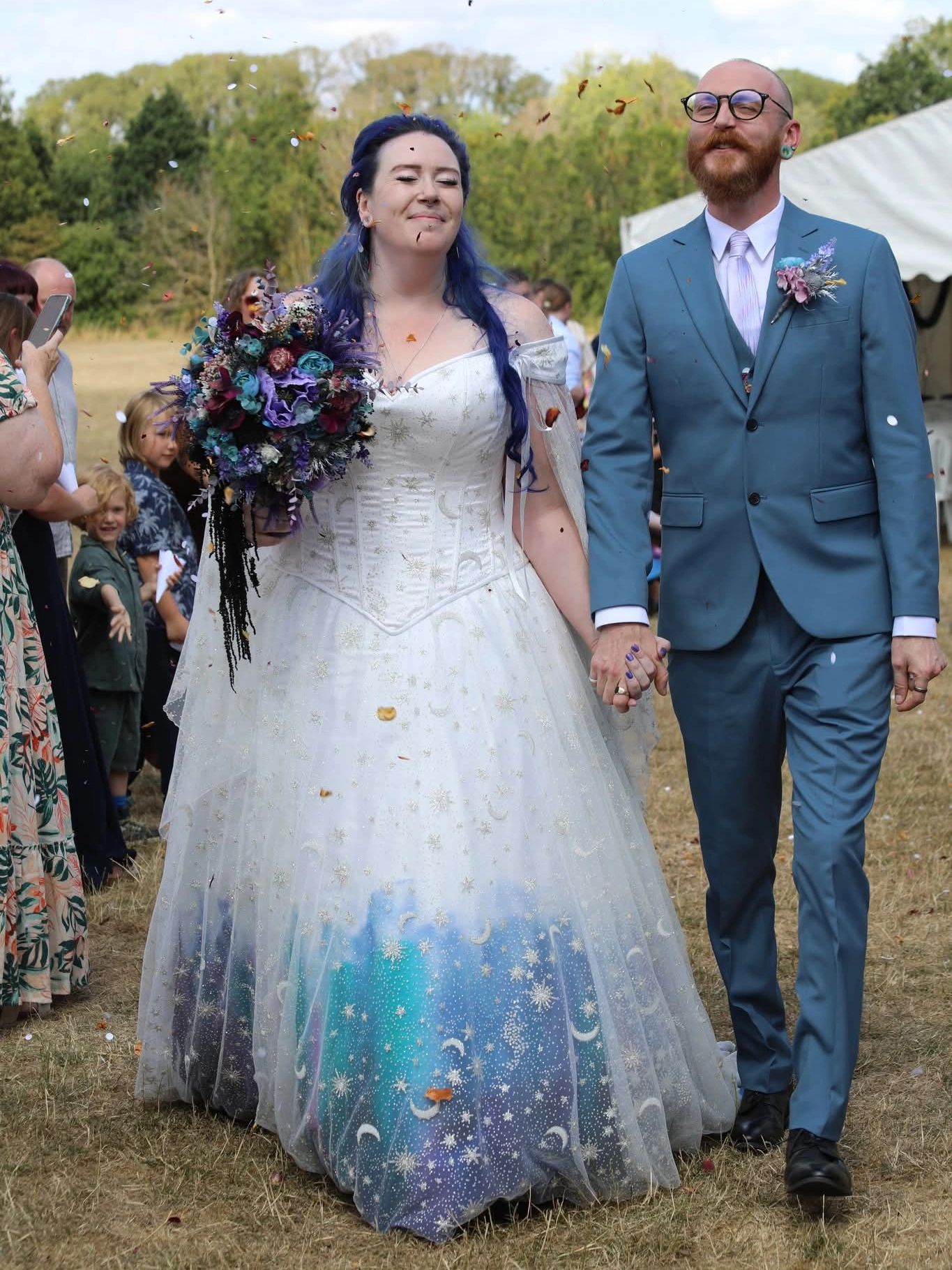 Real bride vikki in her hand dyed silk moon , stars galaxy gown.