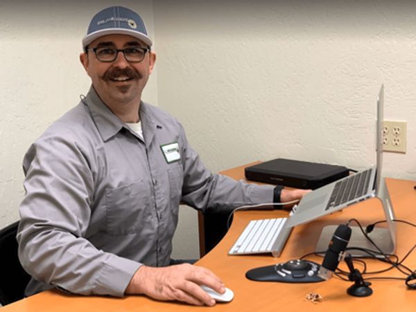 A man giving still for a picture