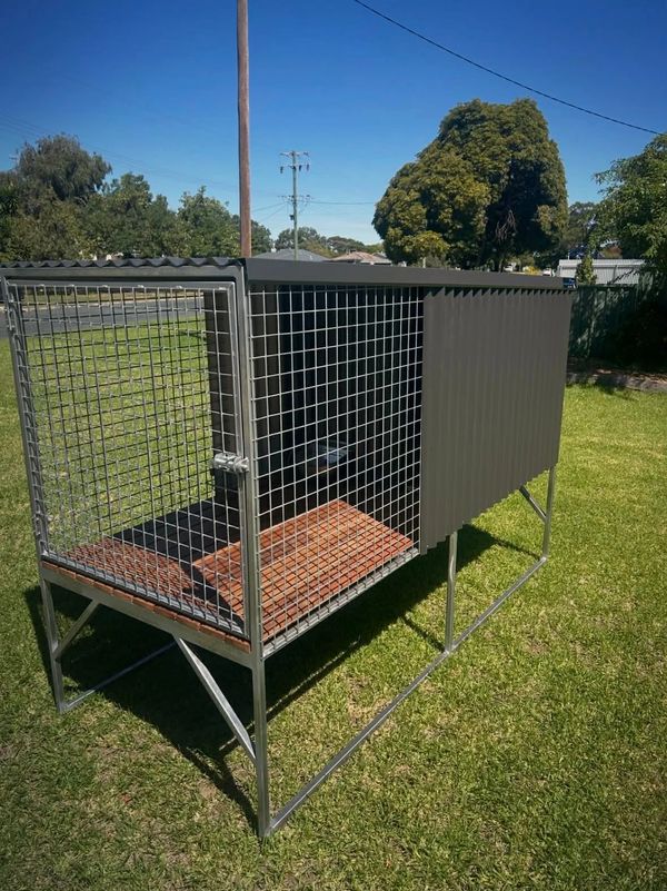 Single bay cage with monument colorbond cladding