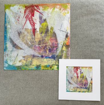 Two prints of the same abstract art; pulls of red, pink, green, blue, etc partially white-washed.