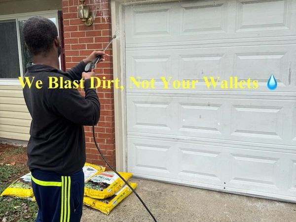 Man pressure washing a garage door with text overlay about blasting dirt.