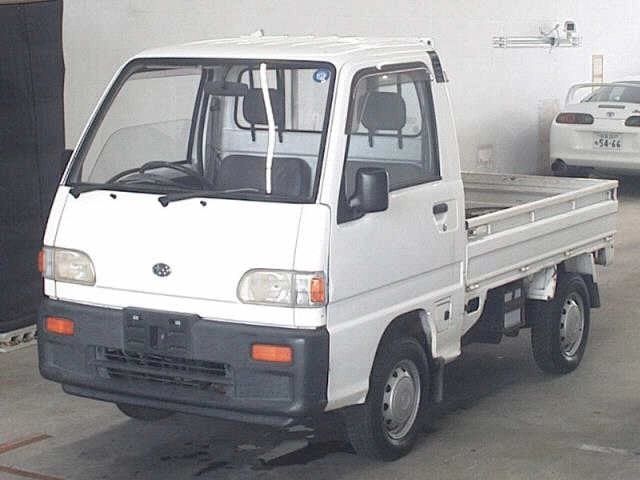 white mini truck subaru 4