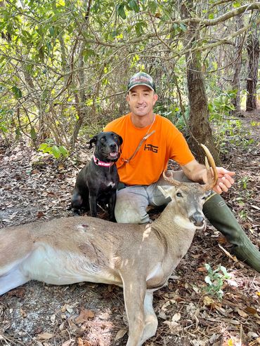 Penny is a Ladner black mouth cur trained for tracking wounded deer in central Florida.