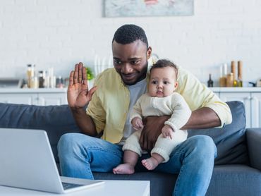 dad holding a baby