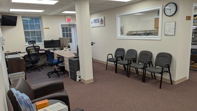 Midwest PROTECH lobby image including seating and front desk