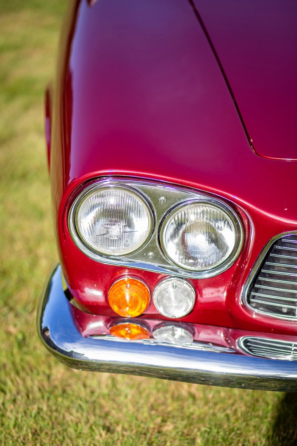 1966 Gordon Keeble GT, close-up view of headlamps 