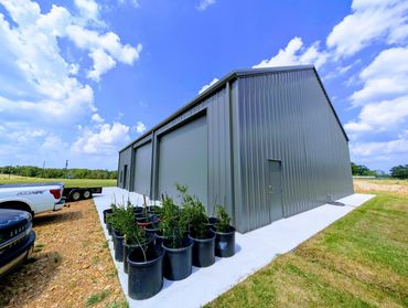 Metal building paintings, garage door painting, Barn dominium painting, Giddings Texas.