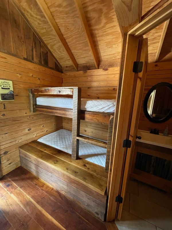 Bunk Beds in Boxcar Bunk Cabin at Trestle Park's Elk River Cabins in Ginger Blue - Noel, Missouri