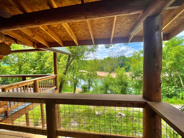 Bedroom Porch on Engelmann Spruce Lodge at Trestle Park in Ginger Blue - Noel, Missouri