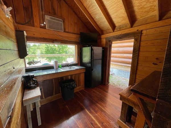 Kitchenette in Boxcar Bunk Cabin at Trestle Park's Elk River Cabins in Ginger Blue - Noel
