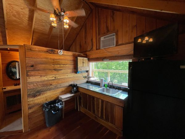 Kitchenette in Boxcar Bunk Cabin at Trestle Park's Elk River Cabins in Ginger Blue - Noel