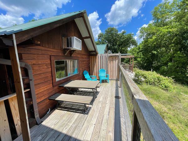 Deck on Boxcar Bunk 2 at Trestle Park's Elk River Cabins in Ginger Blue - Noel, Missouri