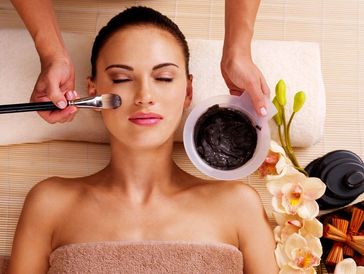 Adult woman having beauty treatments in the spa salon