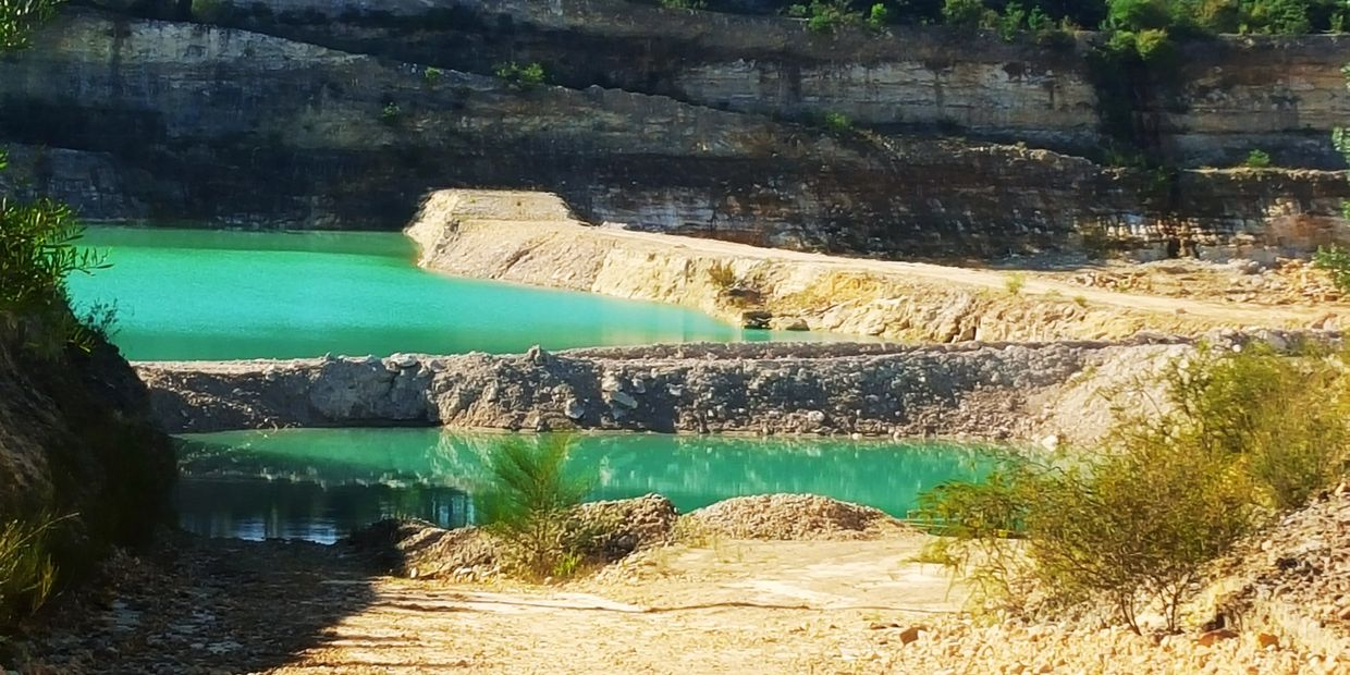 Water retention dams at a sand quarry