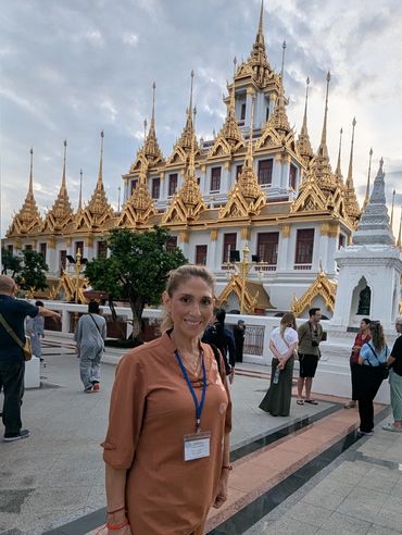 Myriam visiting a sacred temple during her spiritual studies in Asia.