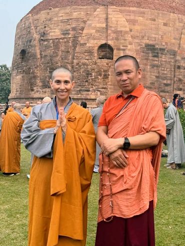 Myriam with a monk during her study of meditation and spiritual practices.