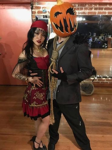 A pirate and Pumpkin Scarecrow.
