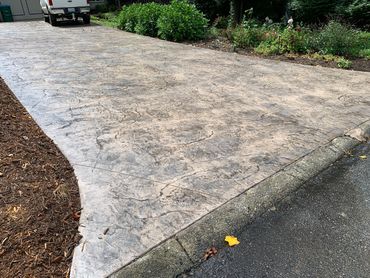 Slate skin stamped concrete driveway!