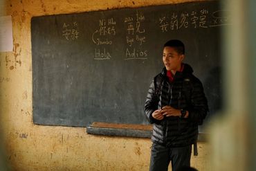 Student from Keystone academy volunteering at Makuyuni Primary School during their Kilimanjaro climb