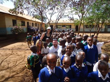 When climbing Mt. Kilimanjaro you can visit a local school and get involved in a project.
