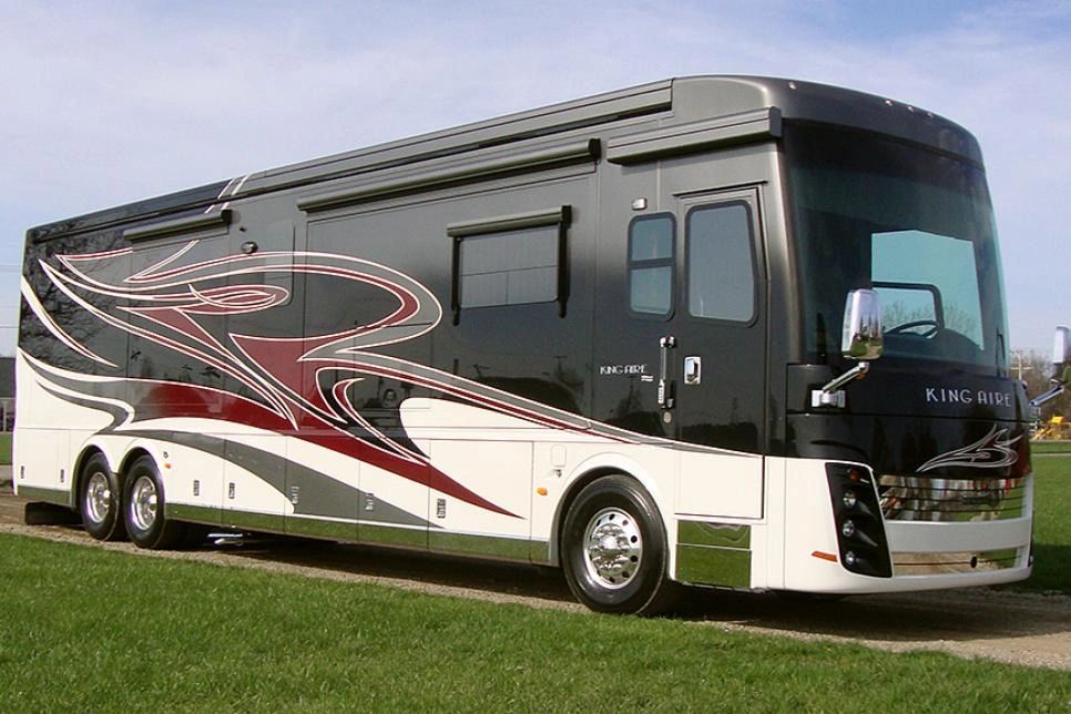 Black, white, and red King Aire RV stock image 
