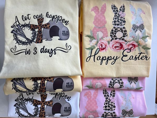 several custom shirts on a table