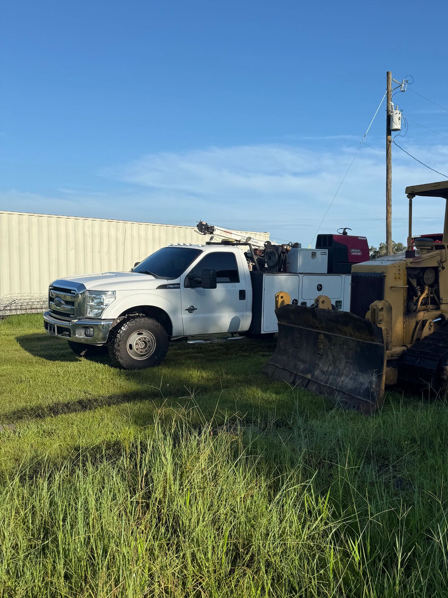 Severns Diesel mobile service truck performing on-site heavy equipment repair in a field