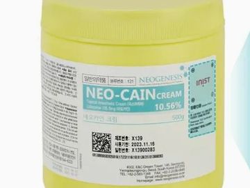 A yellow jar of Neo-Cain cream with detailed labeling and a blue NEOGENESIS logo.