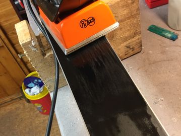 Hot wax for ski boards.
