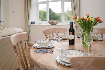 table with wine and flowers