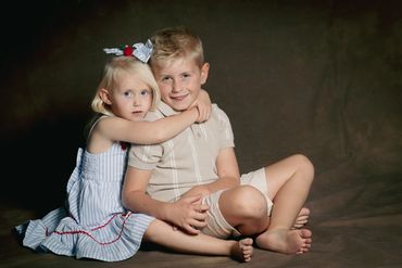 Brother and sister portrait photographed by me in my Stockport Manchester photography studio