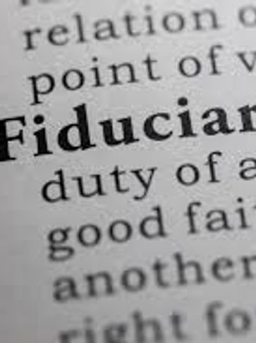 Close-up of the word 'Fiduciary' in a dictionary.