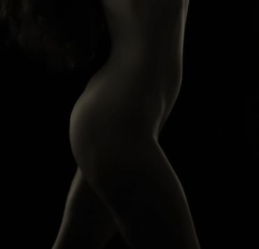 artistic nude featuring midsection of a woman