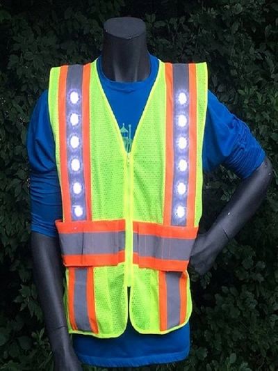 a dummy clad in LED reflective safety jacket