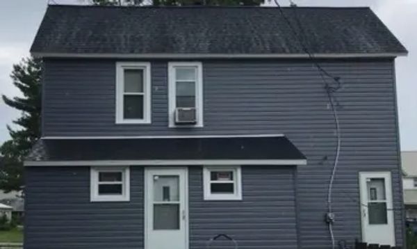 After Thompson & Son's installed new siding.