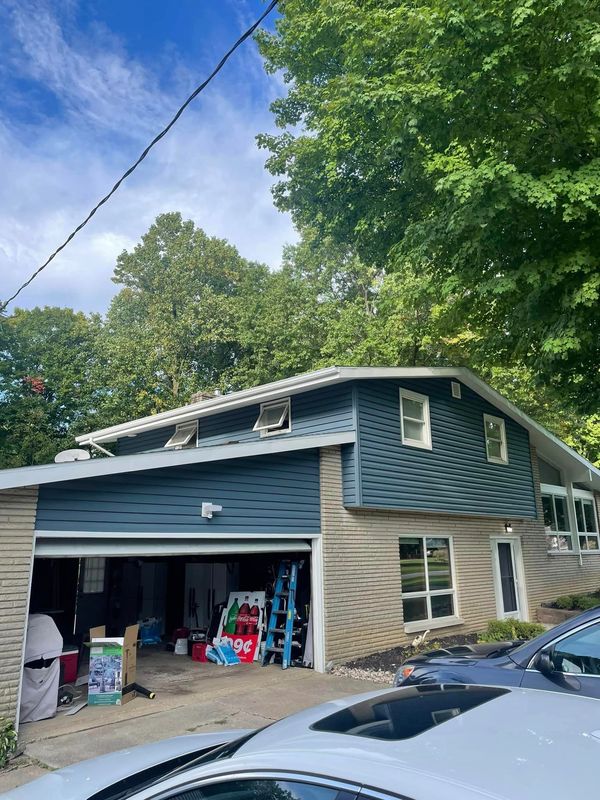 We installed new siding and window wrap for great homeowners.