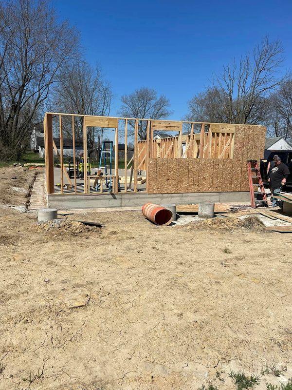 The beginning of our first community project, Framing and finishing a beautiful Habitat House.